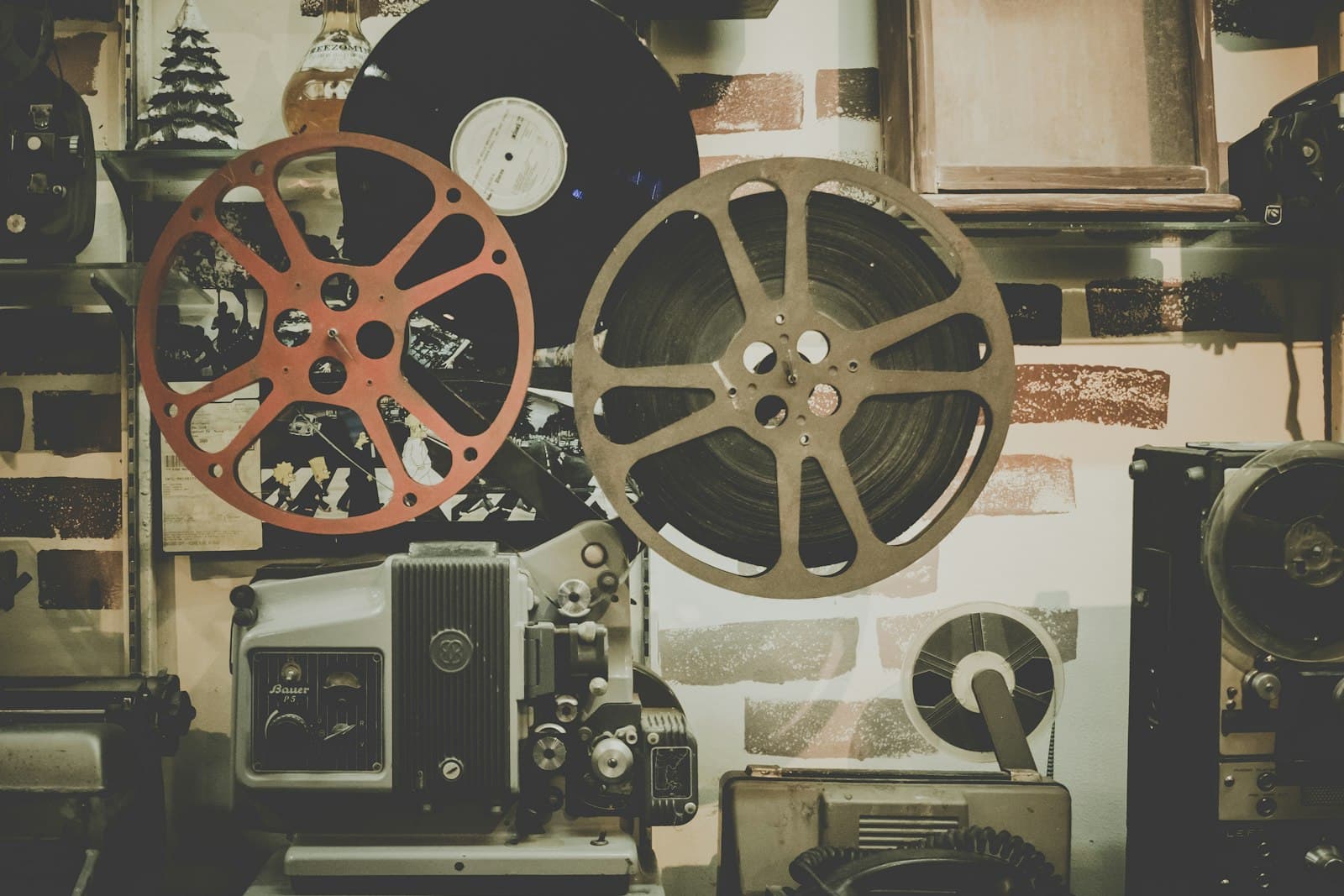 Vintage film reels and projector equipment on a shelf